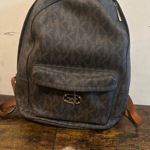 Michael Kors Black and Brown Backpack Sleek Design